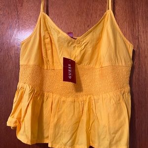 yellow sleeveless top
